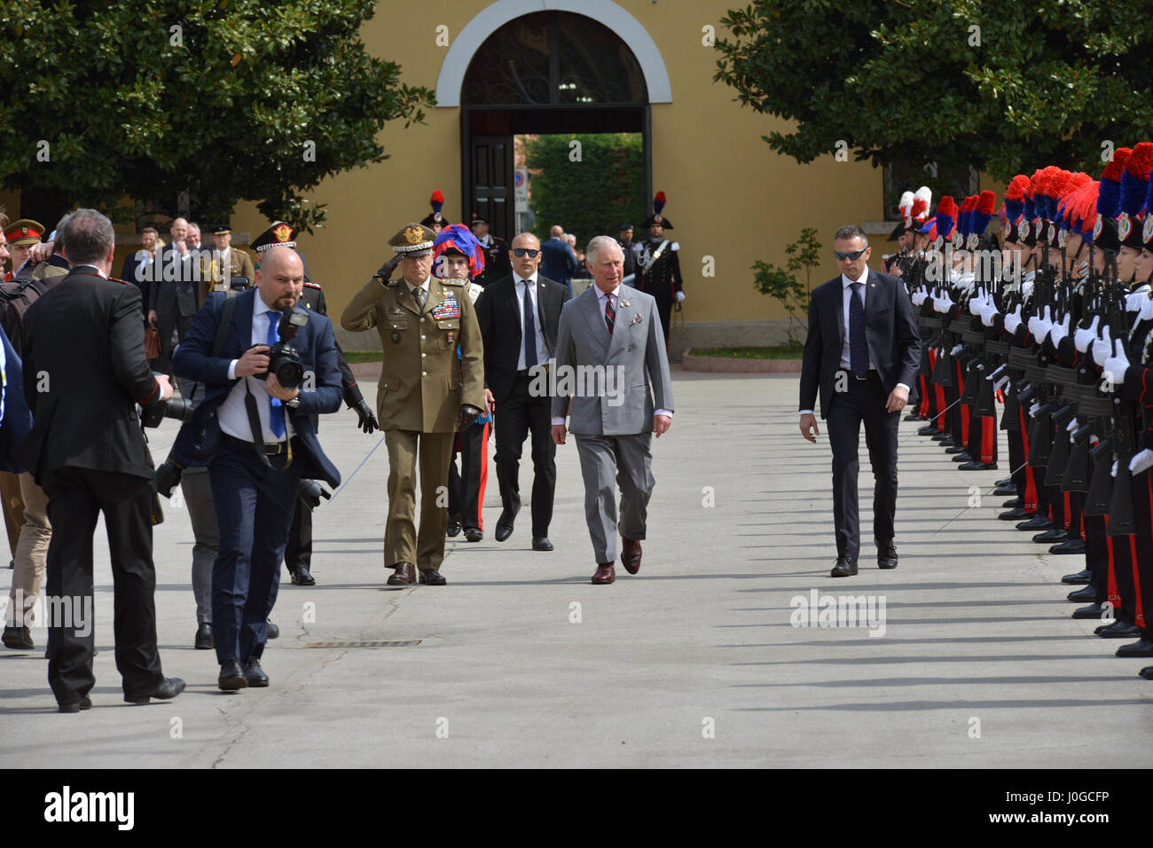 The Royal Highness, Prince Charles, Prince of Wales (right), Gen. Claudio Graziano, Italian Army Chief of Staff (center) and Gen. Tullio Del Sette, Italian Carabinieri General Commander (left), pass and review the Italian Carabinieri formation during visit at Center of Excellence for Stability Police Units (CoESPU) Vicenza, Italy, April 1, 2017. (U.S. Army Photo by Visual Information Specialist Antonio Bedin/released) Stock Photo