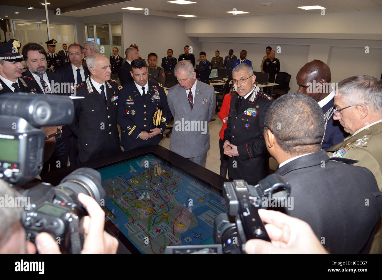 The Royal Highness, Prince Charles, Prince of Wales, observes the training room 'Magistra' during visit at Center of Excellence for Stability Police Units (CoESPU) Vicenza, Italy, April 1, 2017. (U.S. Army Photo by Visual Information Specialist Antonio Bedin/released) Stock Photo
