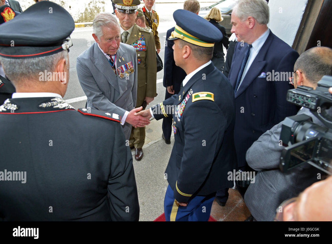 The Royal Highness, Prince Charles, Prince of Wales, thanks U.S. Army Col. Darius S. Gallegos, CoESPU deputy director, during visit at Center of Excellence for Stability Police Units (CoESPU) Vicenza, Italy, April 1, 2017. (U.S. Army Photo by Visual Information Specialist Antonio Bedin/released) Stock Photo