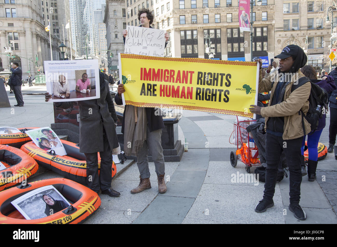 City Of Refuge: 24 hour action for refugees took place on March 28 & 29 in New York City to stand up against President Trump's executive orders that threaten refugees, people applying for asylum and immigrants at risk for deportation to countries where they'll be in danger. Rally at Foley Square, NYC. Stock Photo