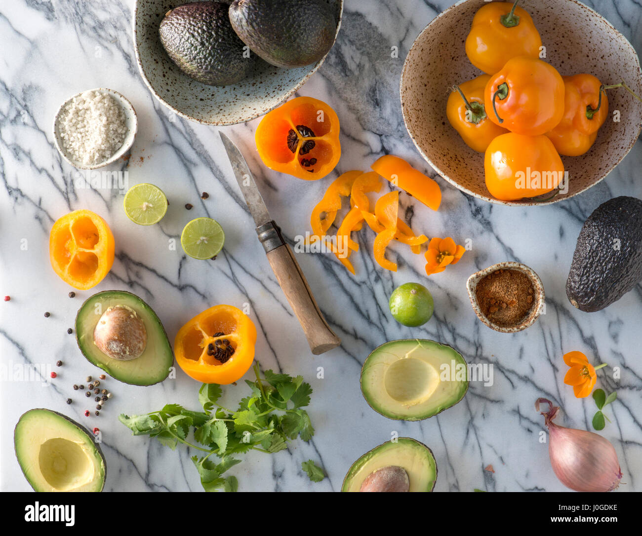Making Guacamole with ingredients Stock Photo