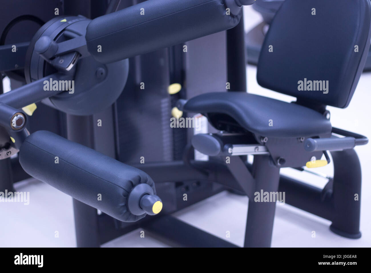 Leg weights extension for quadriceps and curl for hamstrings gym