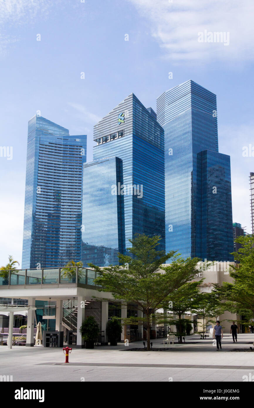 The Marina Bay Financial Centre (MBFC) towers taken from Collyer Quay, Singapore Stock Photo