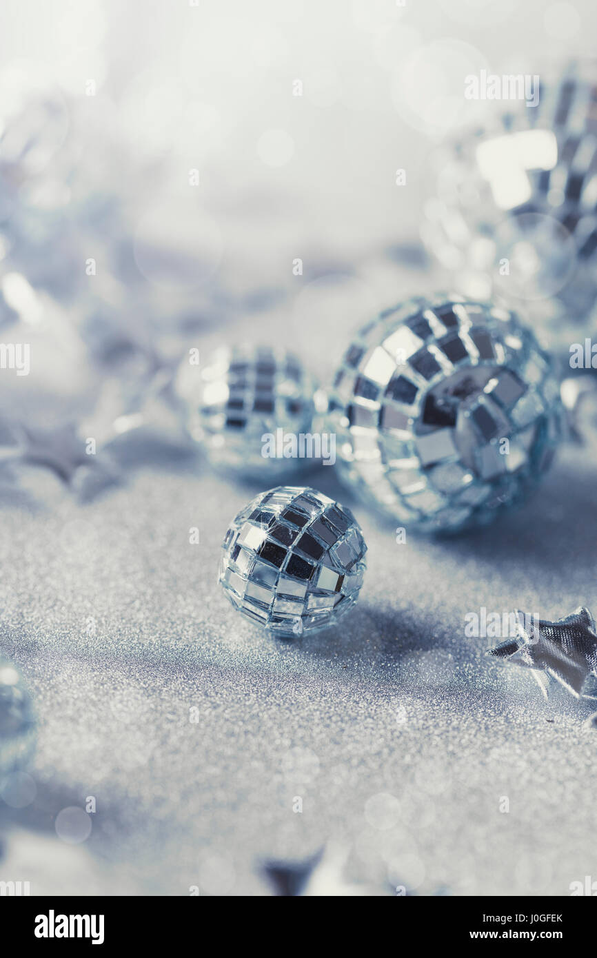 Silver christmas baubles in the snow hi-res stock photography and ...
