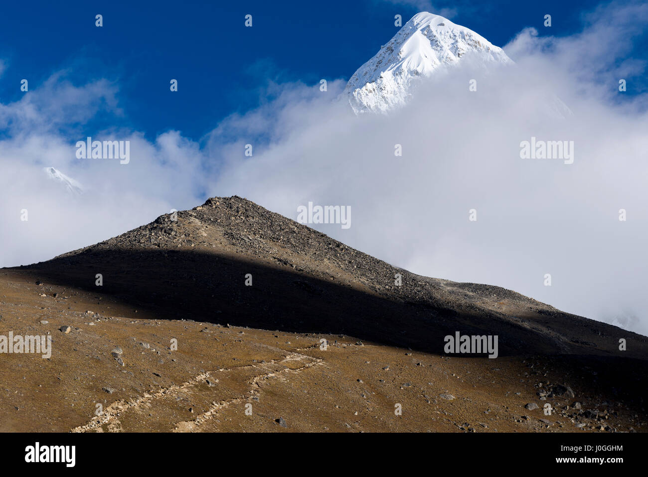 Pumo Ri (7165 m) towers over Kala Pattar (5550 m) in the Nepal Himalaya