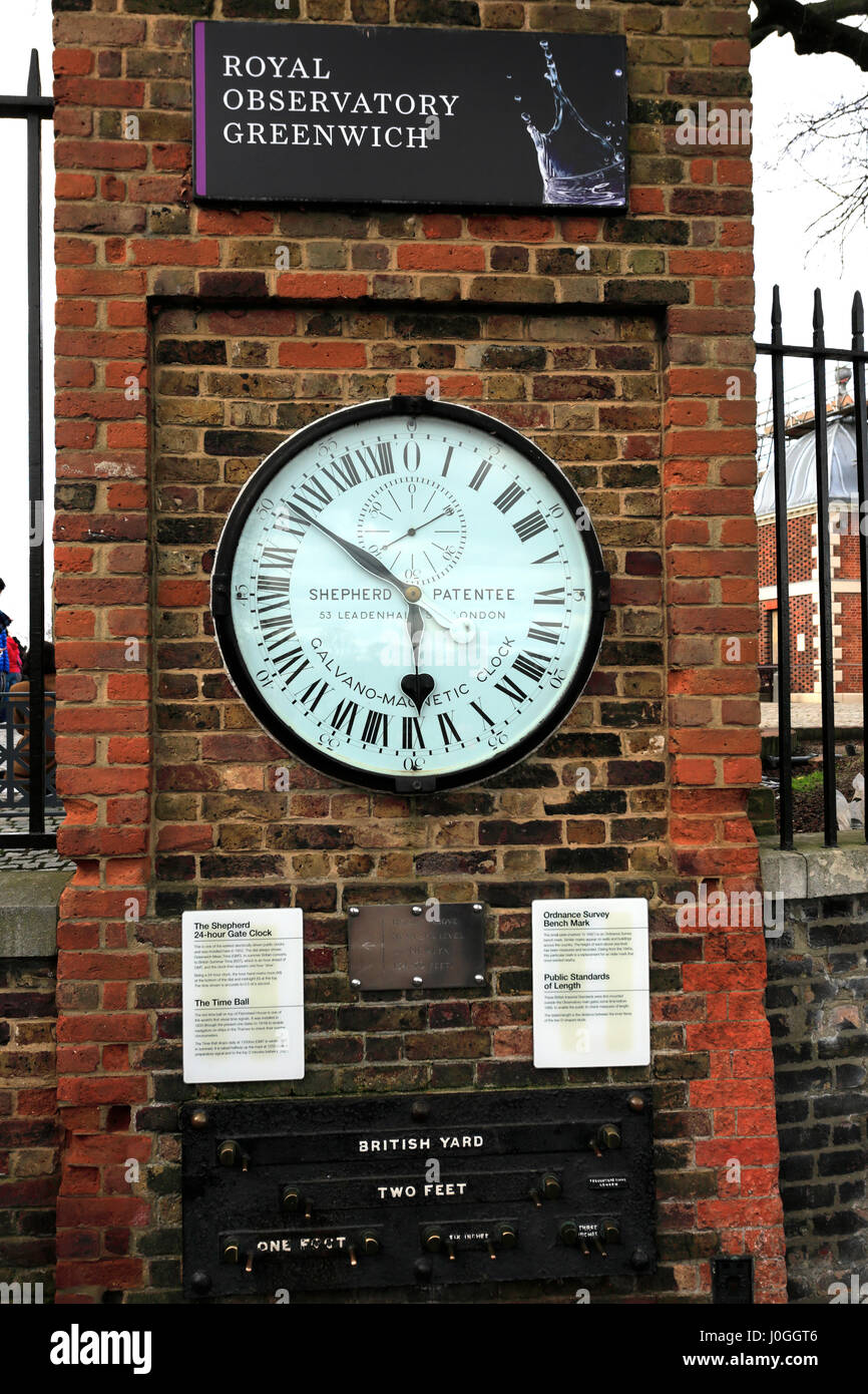The Shepherd Gate 24hr clock, Public Measures of Length, and Ordnance Survey Bench Mark, Greenwich Mean Time, Royal Observatory, Greenwich Stock Photo