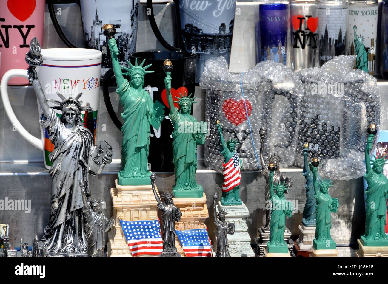New York City - September 4, 2009: An array of NYC souvenirs on display at a vendor's cart in Battery Park Stock Photo
