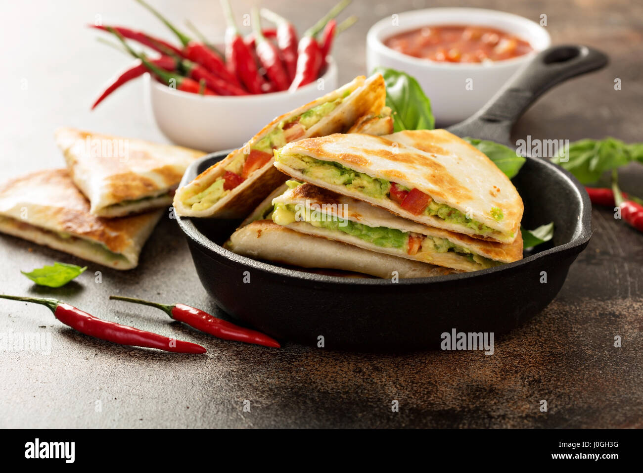 Vegan quesadillas with avocado and red pepper Stock Photo