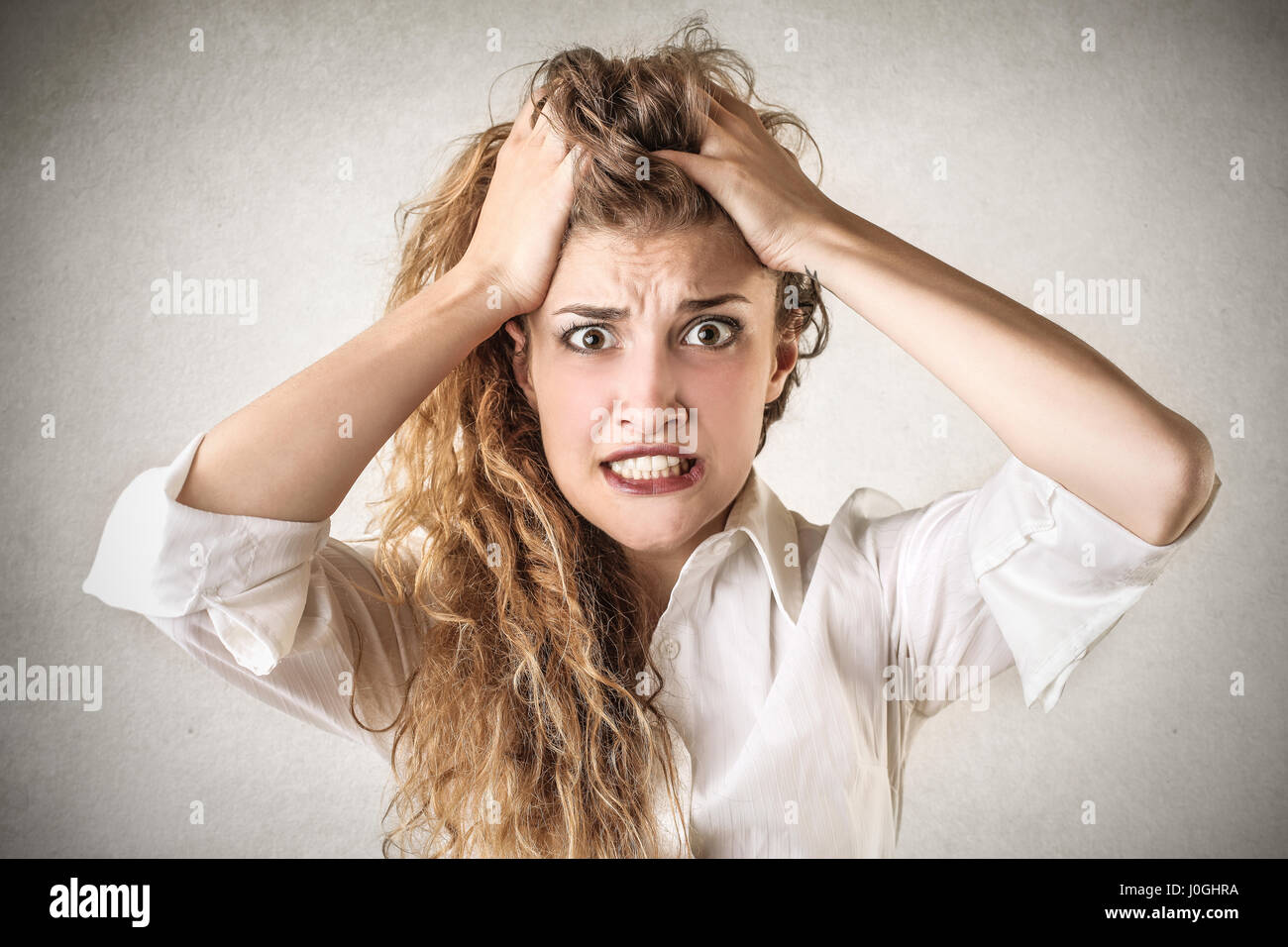 Woman being stressed Stock Photo