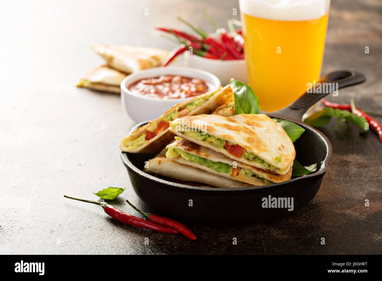Vegan quesadillas with avocado and red pepper Stock Photo