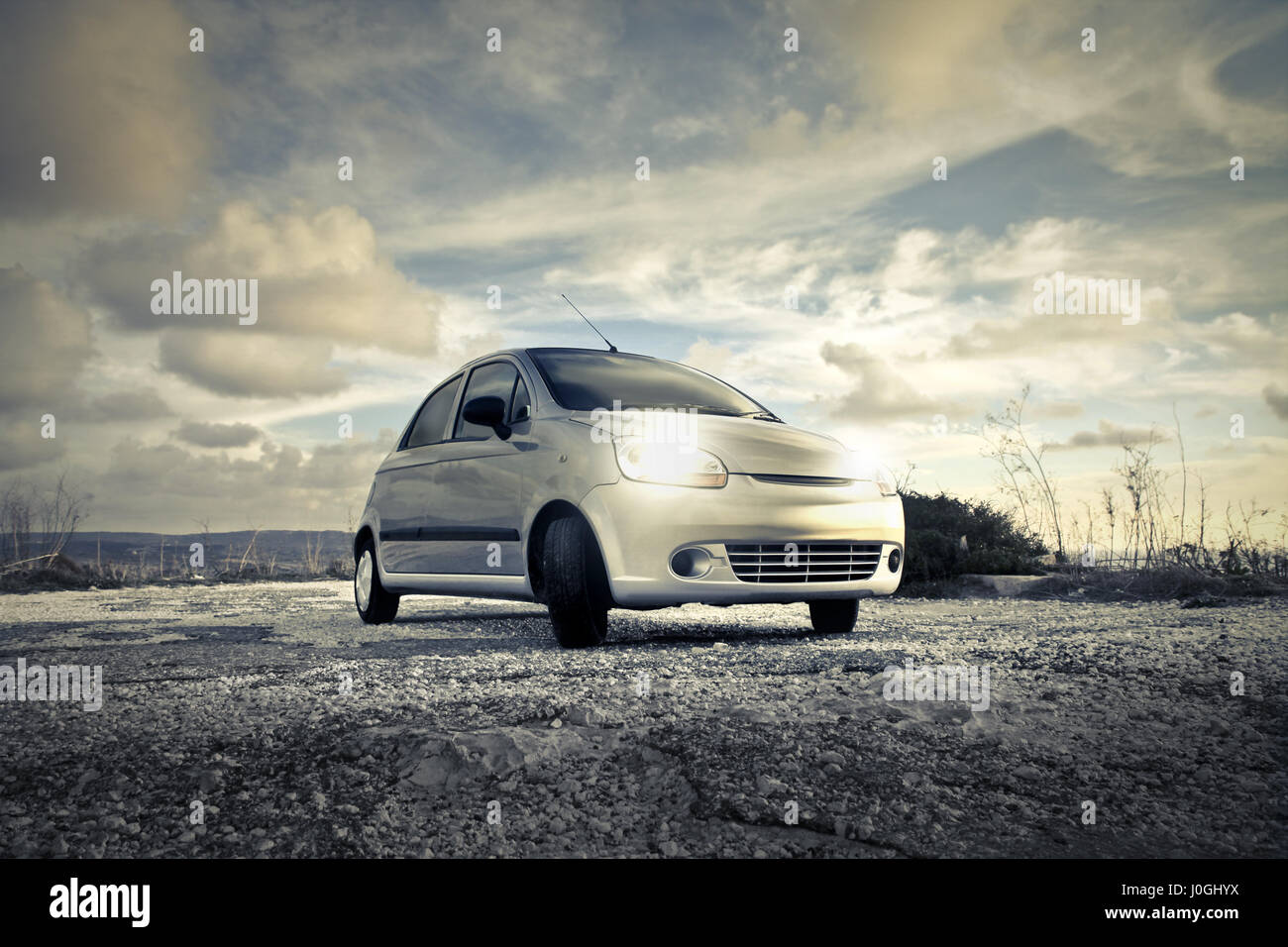 Car at sunset Stock Photo - Alamy