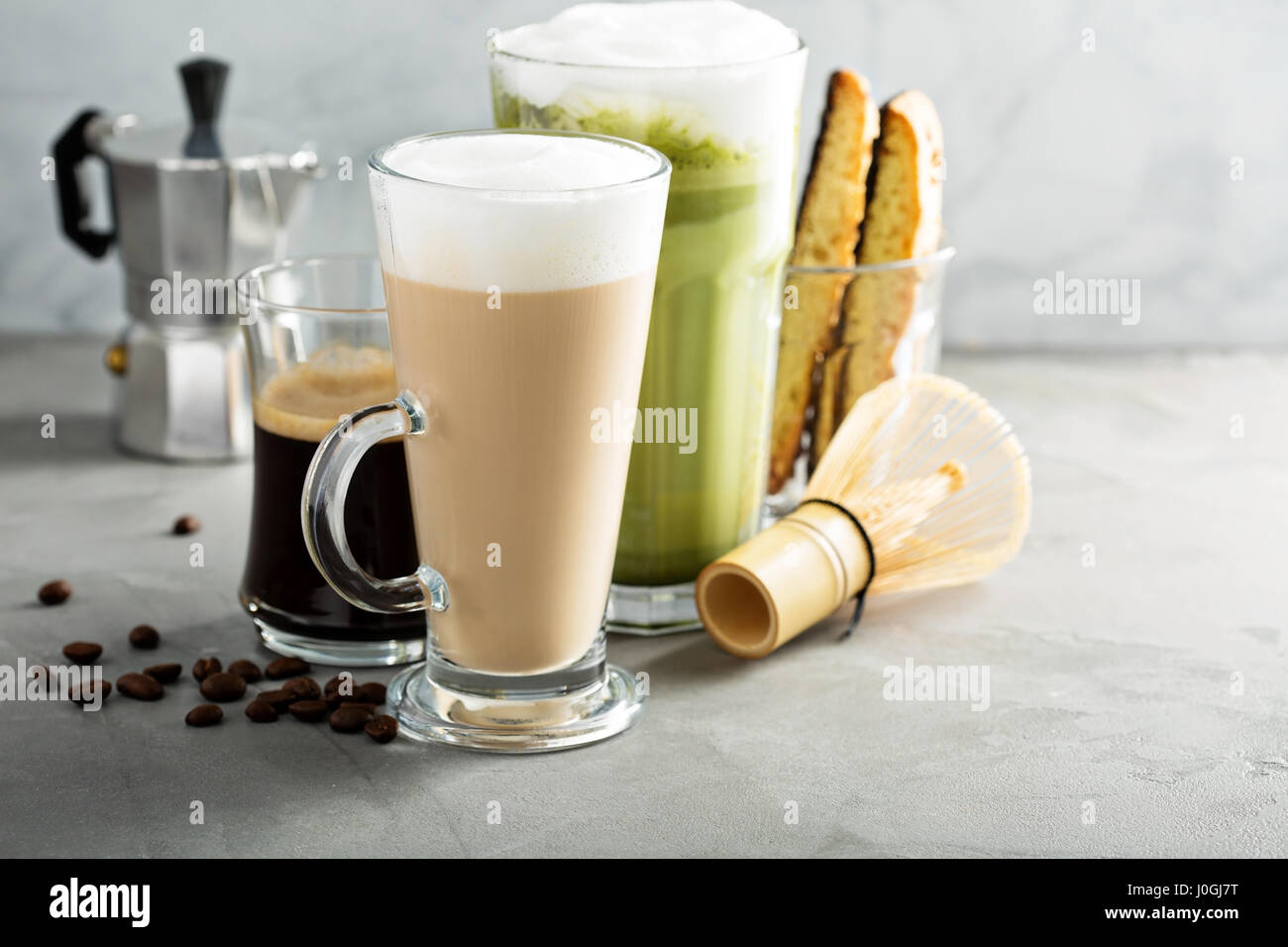 Espresso, regular coffee and matcha latte Stock Photo Alamy
