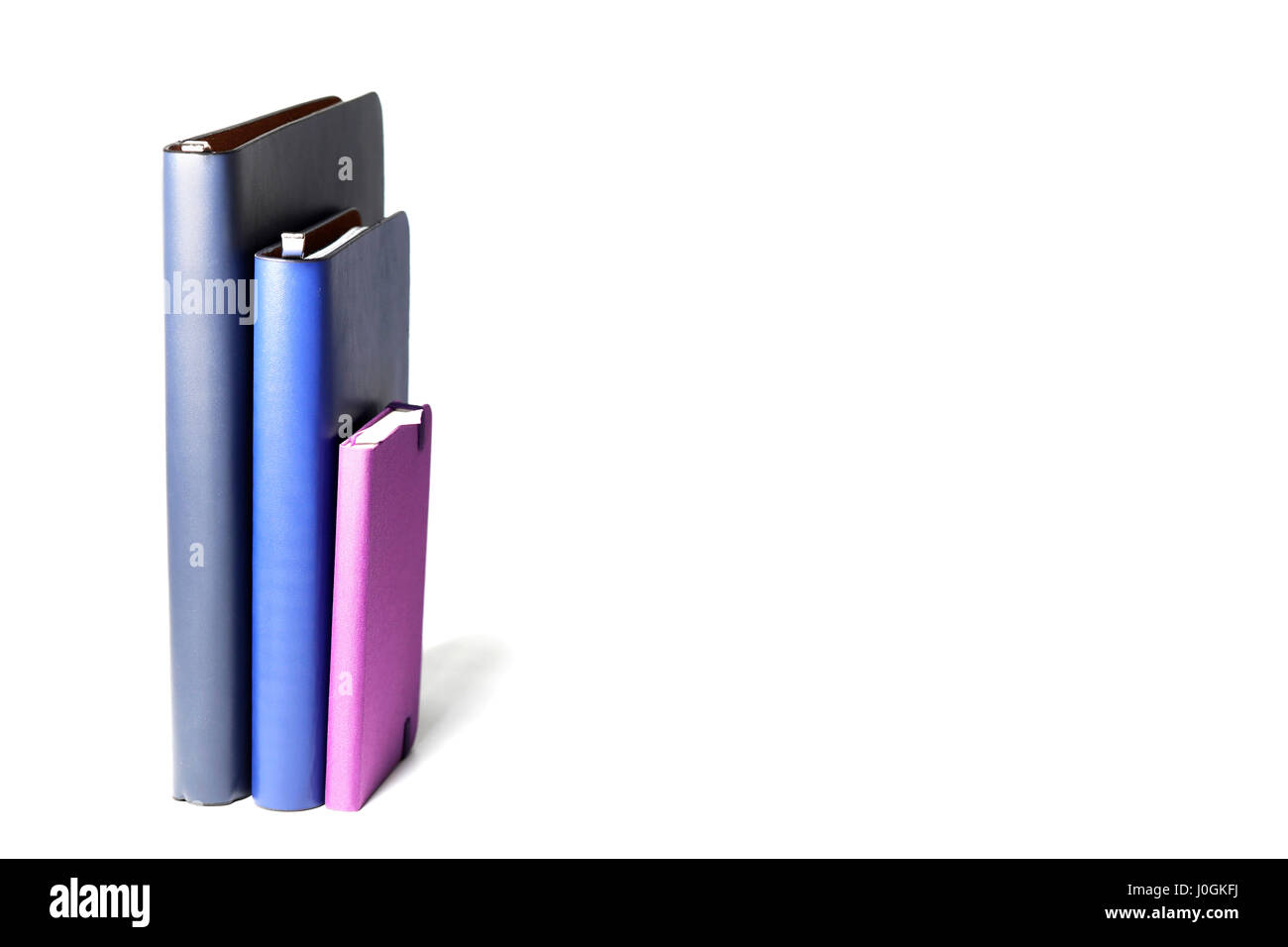 Notebooks isolated on white background Stock Photo - Alamy