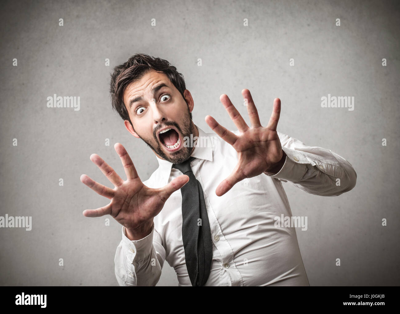 Man being scared Stock Photo