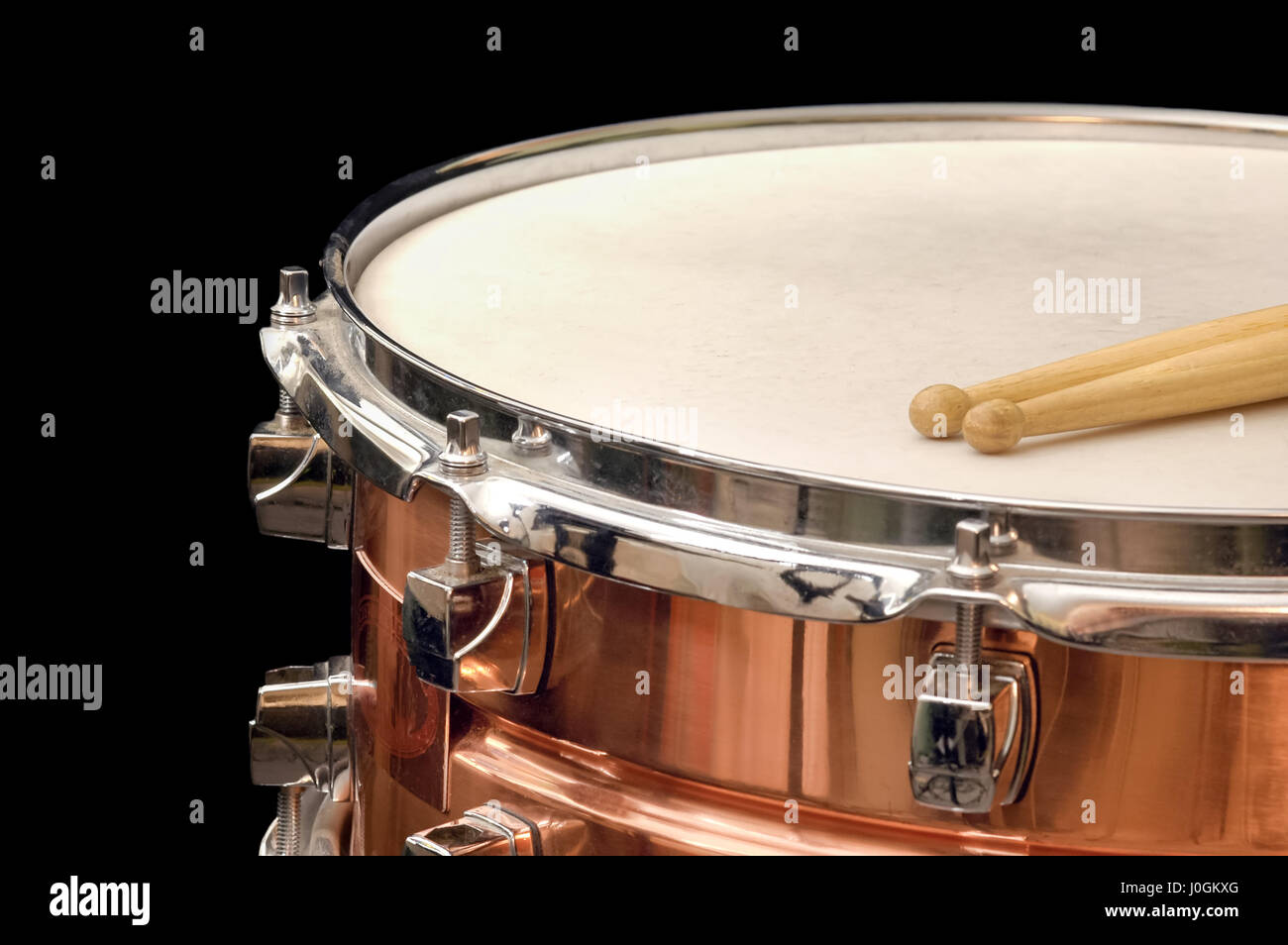 copper snare drum and sticks closeup on black Stock Photo Alamy