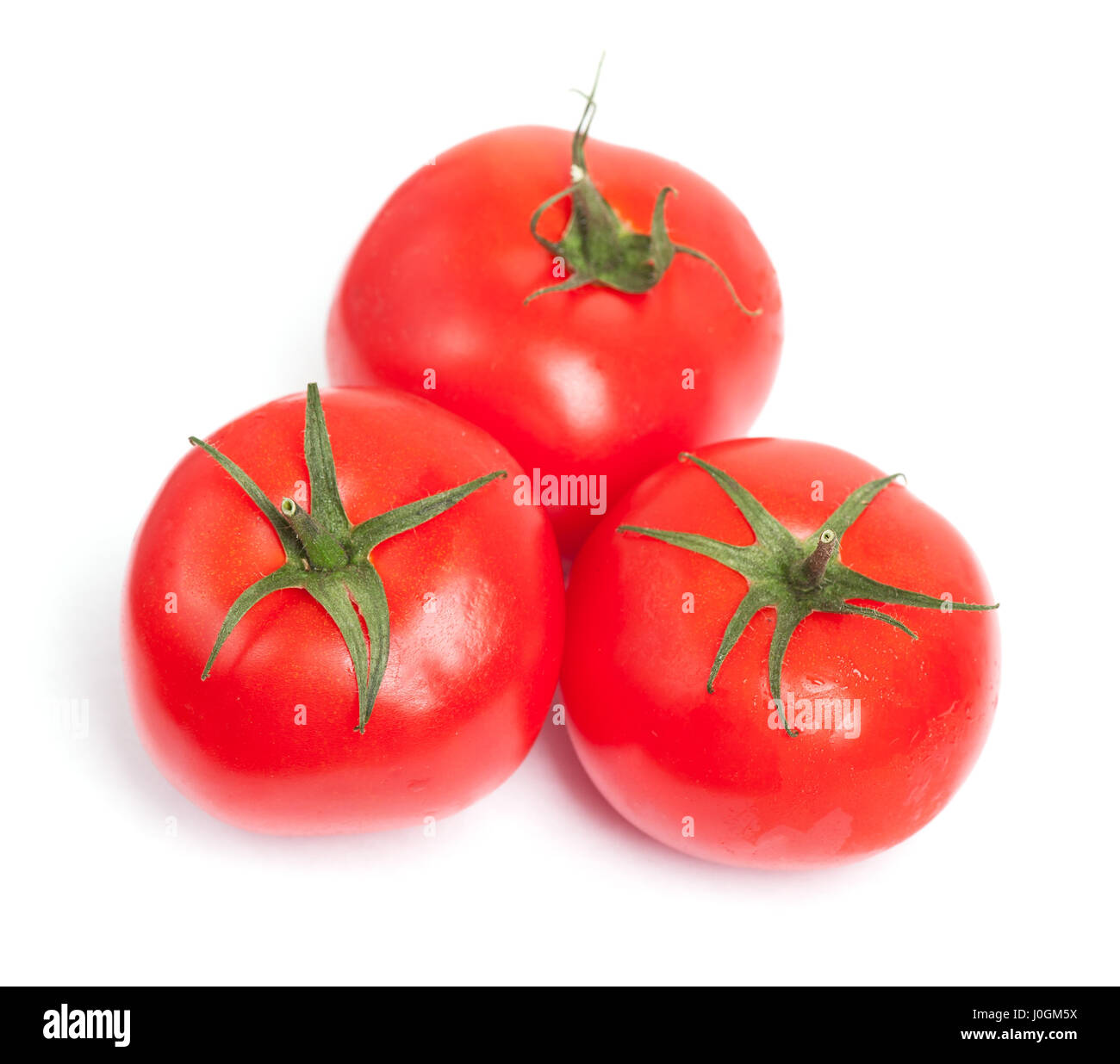 Tomatoes isolated on white background Stock Photo - Alamy