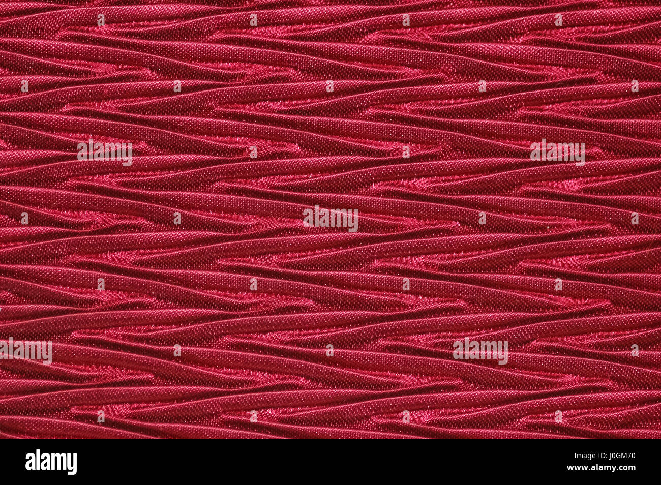 deep red textured fabric closeup Stock Photo Alamy