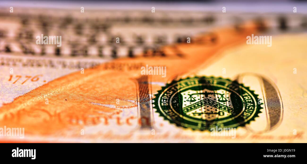 Macro shot on the 100 USD bill with narrow field of view and the balance partially in focus Stock Photo