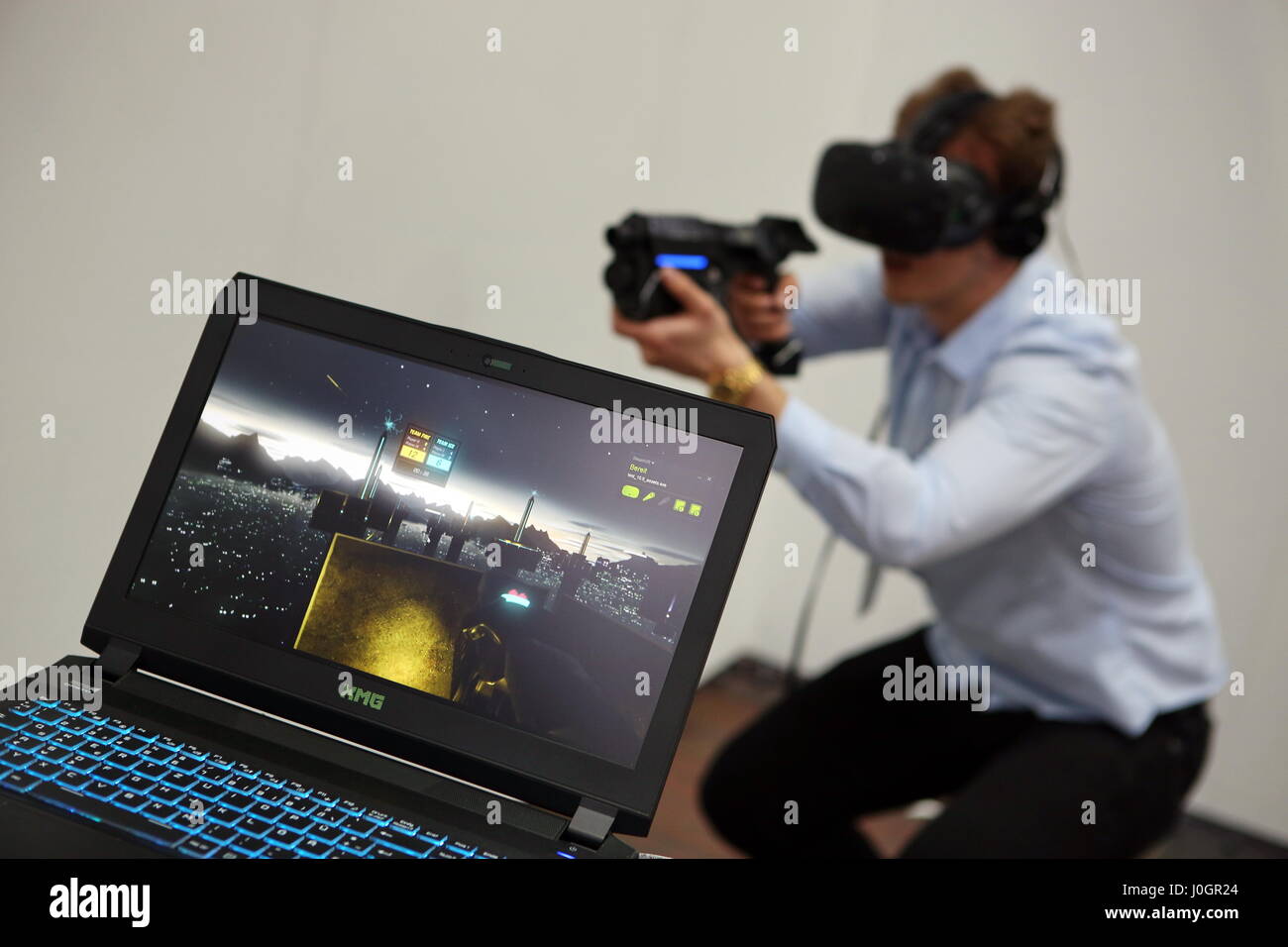 Hanover, Germany. 21th March, 2017. Virtual Reality application - webblog 'VR-Nerds' demonstrates Virtual-Reality-Shooter-Game 'Tower Tag' (with Teamplay-Mode/PvP/coop), visitors can test it. CeBIT 2017, ICT trade fair, lead theme 'd!conomy - no limits'. Photocredit: Christian Lademann Stock Photo