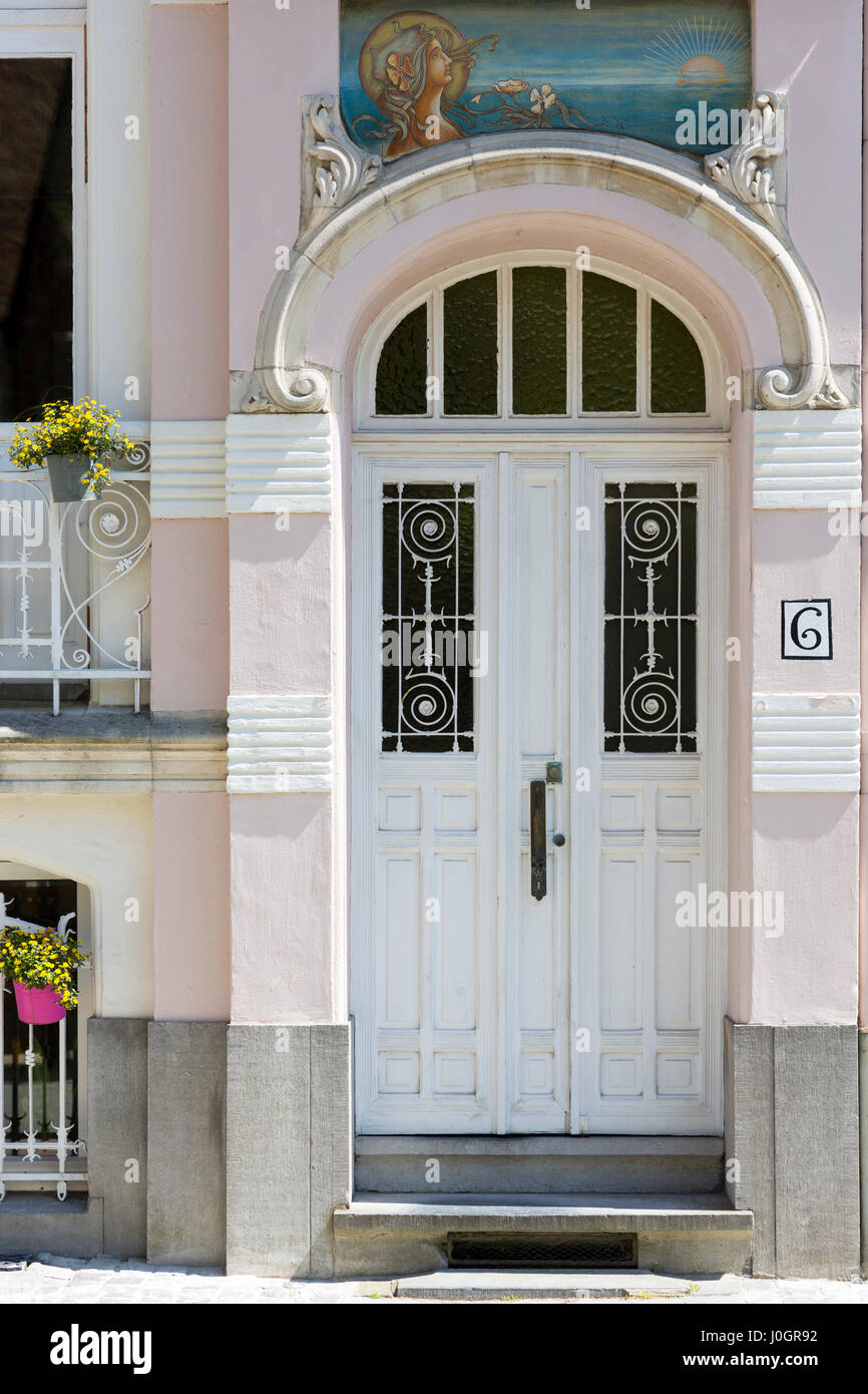 Traditional Belgian architecture ornate door and doorway portico in Bruges - Brugge - Belgium Stock Photo
