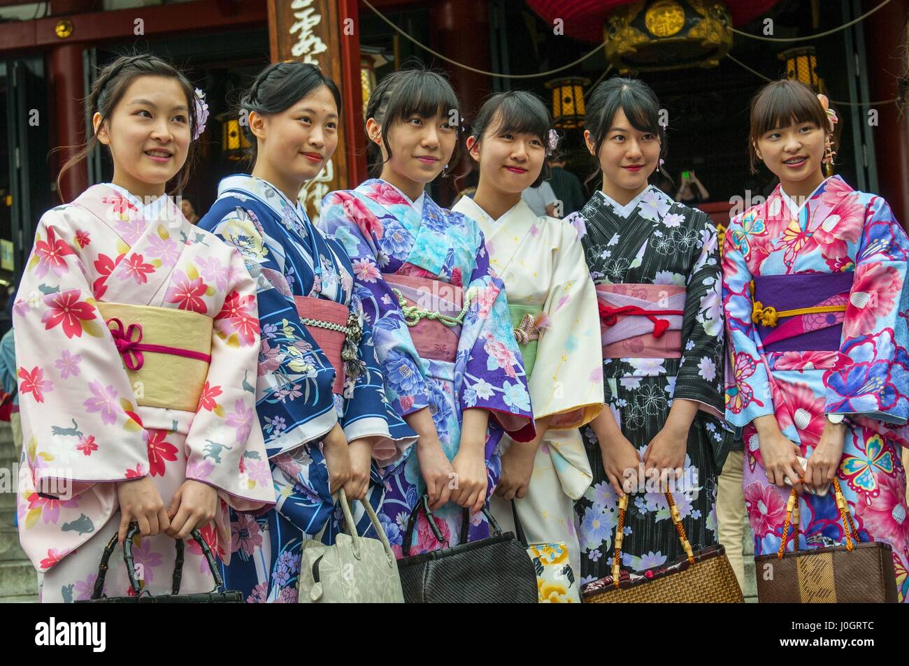Young Japanese women wearing a traditional dress called Kimono at Senso-ji  Temple in Tokyo, Japan Stock Photo - Alamy