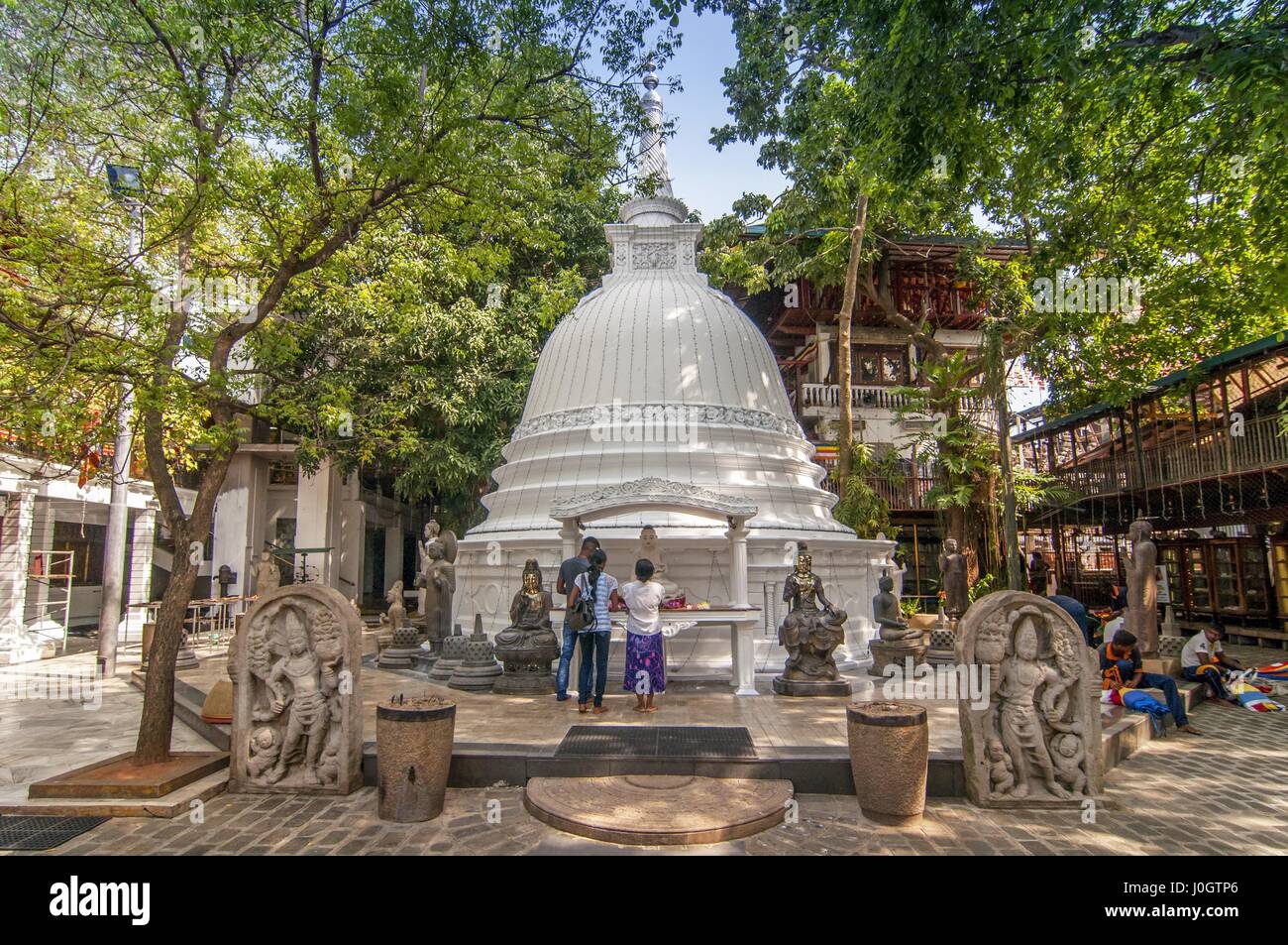 White stupa Gangaramaya Buddhist Temple, Colombo, Sri Lanka Stock Photo