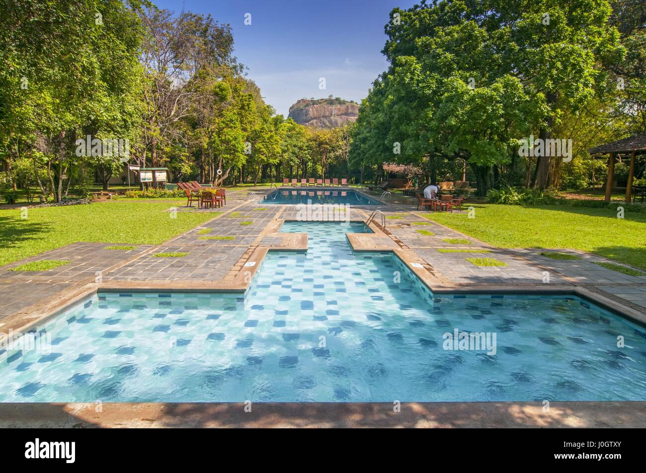 Swimming pool view to Rock Palace at Hotel Sigiriya, Sigiriya, Central Province, Sri Lanka, Asia Stock Photo