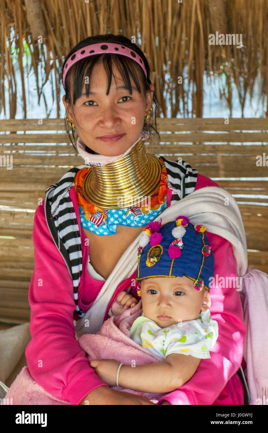 Mother and Baby at the Long neck people and Hill Tribe of Northern Thailand the long neck people in Palong village. Stock Photo