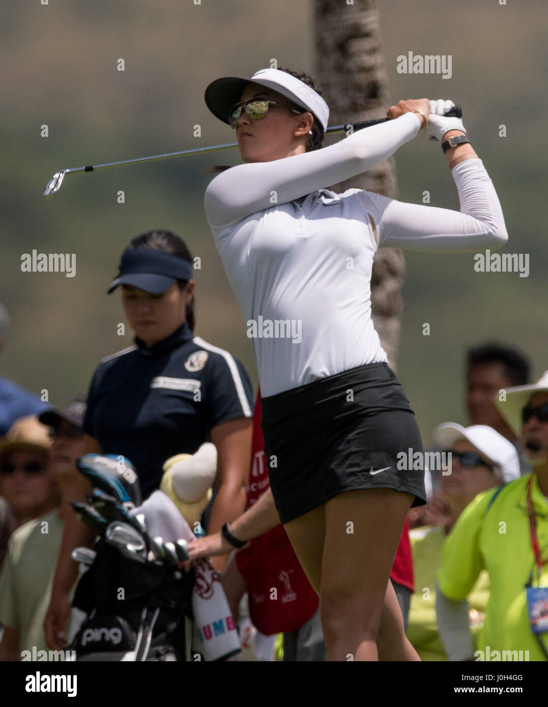 Honolulu, Hawaii, USA. 12th Apr, 2017. during Round 1 of the LPGA LOTTE Championship presented by Hershey at the Ko Olina Golf Club in Honolulu, Hawaii. Steven Erler/CSMApril 12, 2017: Michelle Wie tees off at the 8th hole during Round 1 of the LPGA LOTTE Championship presented by Hershey at the Ko Olina Golf Club in Honolulu, Hawaii. Wie ended at 1-under par and tied for 47th place. Steven Erler/CSM/Alamy Live News Stock Photo