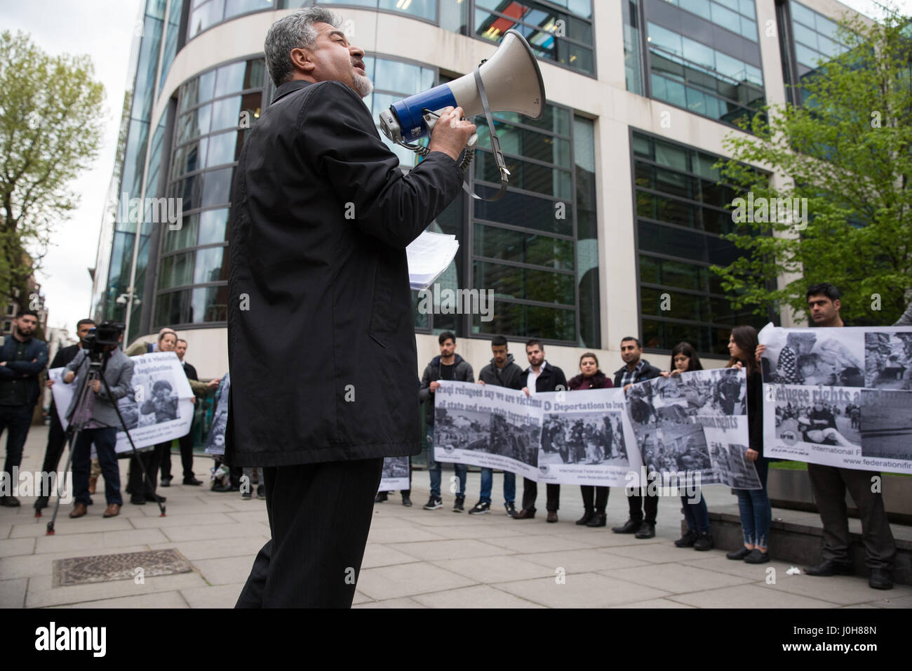 London, UK. 13th April, 2017. Dashty Jamal addresses members of the UK's Iraqi community and supporters attending an emergency demonstration organised by the International Federation of Iraqi Refugees to protest against the detention of 30 Iraqi refugees during the past week, believed to be in preparation for a mass deportation charter flight to Iraq. Stock Photo
