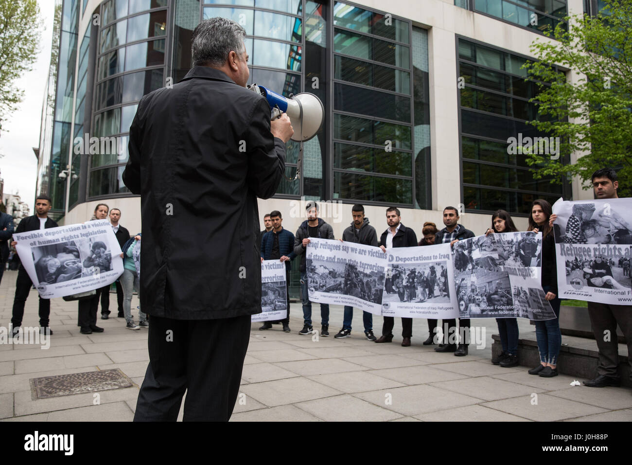 London, UK. 13th April, 2017. Dashty Jamal addresses members of the UK's Iraqi community and supporters attending an emergency demonstration organised by the International Federation of Iraqi Refugees to protest against the detention of 30 Iraqi refugees during the past week, believed to be in preparation for a mass deportation charter flight to Iraq. Stock Photo