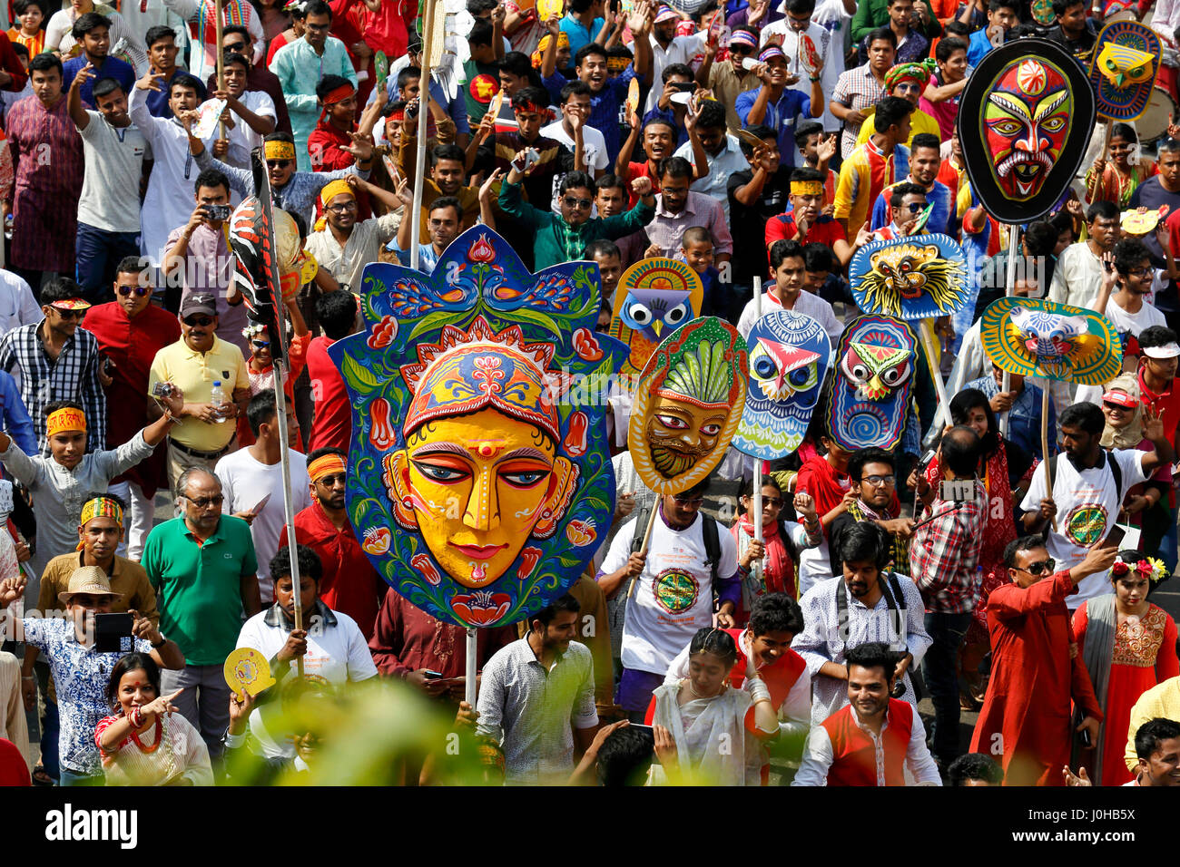 Dhaka, Bangladesh. 14th Apr, 2017. Mangal Shobhajatra, a colourful and festive procession celebrating Pahela Baishakh, the Bangala New Year, sets off from the Fine Arts Faculty of Dhaka University to march through the capital. It has been inscribed on Unesco's Representative List of Intangible Cultural Heritage of Humanity. Credit: Muhammad Mostafigur Rahman/Alamy Live News Stock Photo