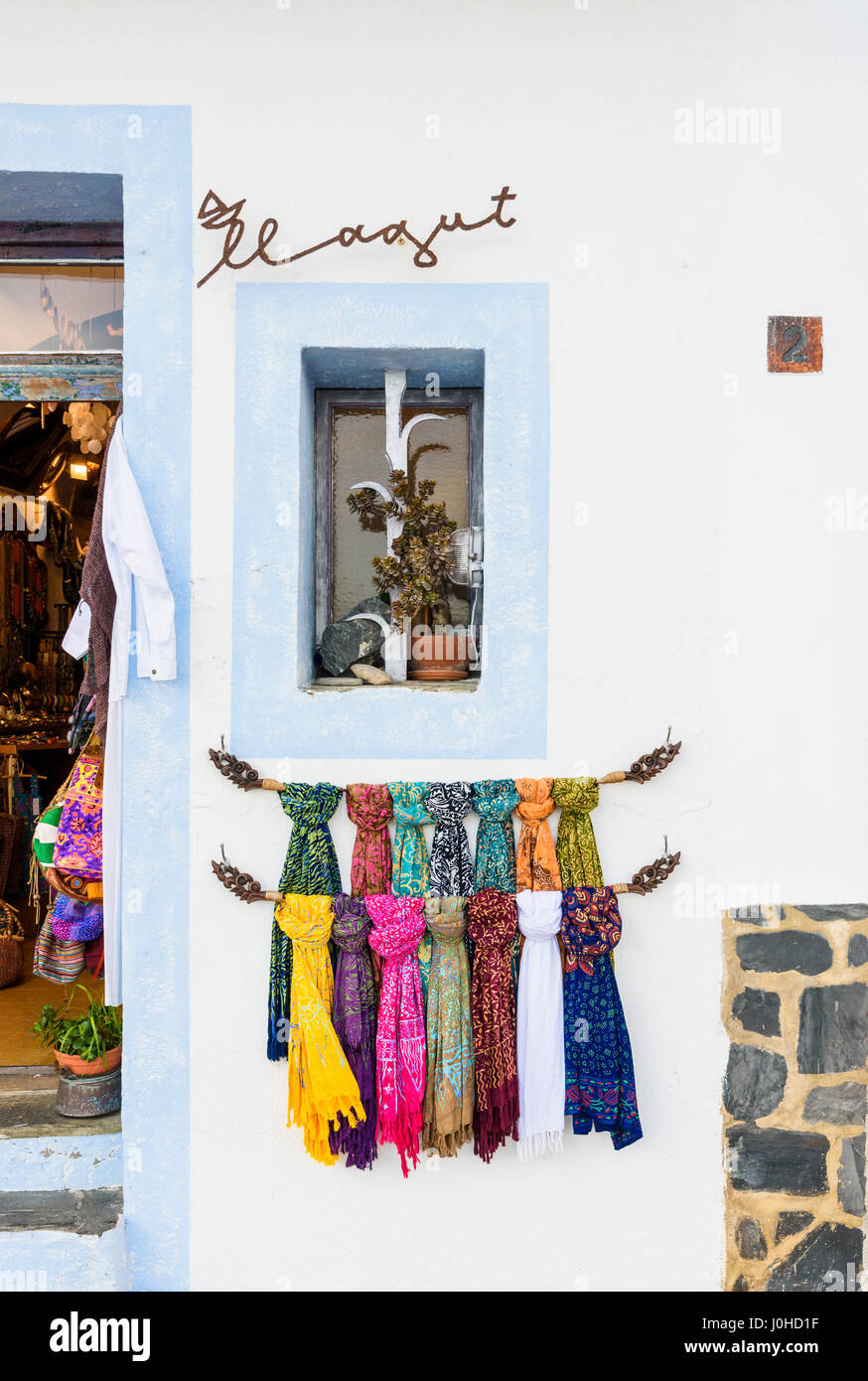 Detail of colourful scarves on a wall outside a shop in Cadaques, Catalonia, Spain Stock Photo