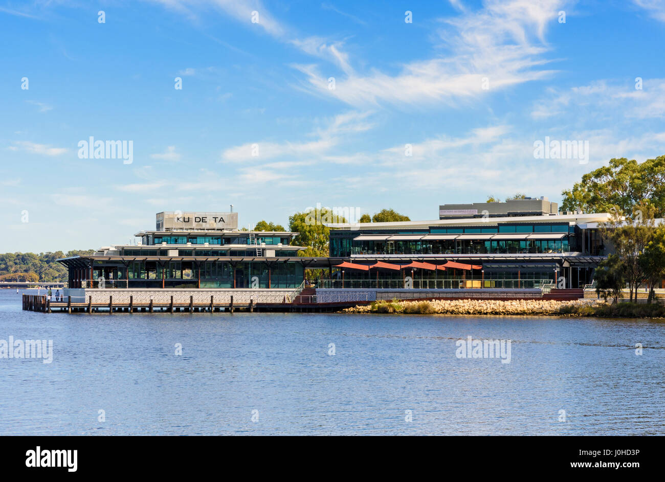 Views over the Swan River towards the Ku De Ta restaurant in the On The Point development, Point Fraser, Perth, Western Australia Stock Photo