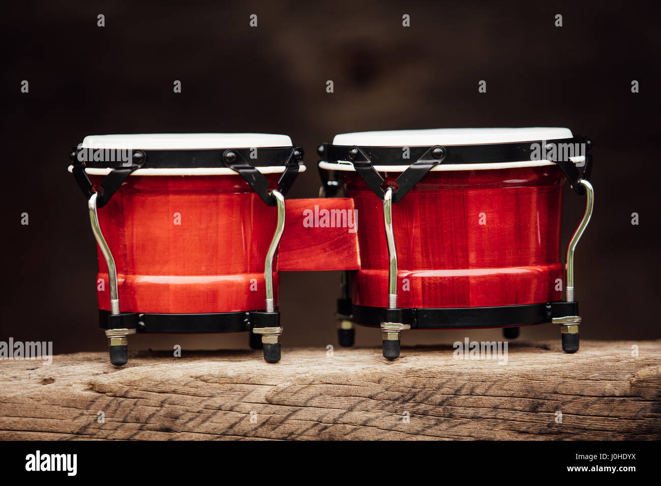 bongo drums on old wood plank Stock Photo
