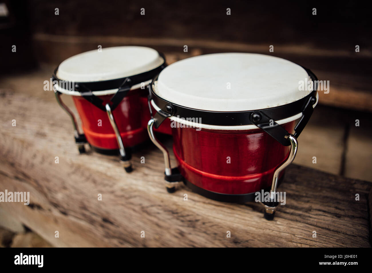 bongo drums on old wood plank Stock Photo Alamy