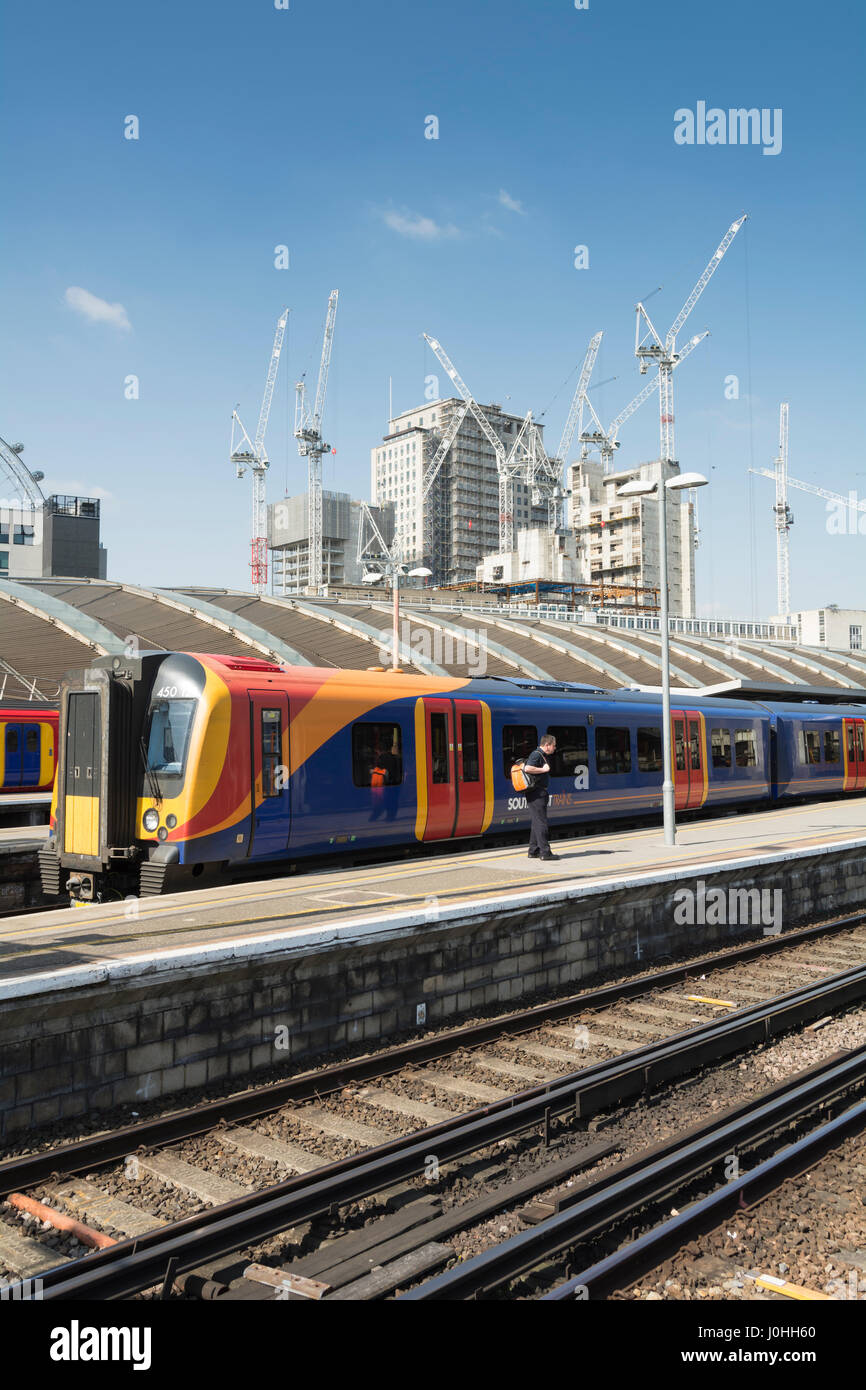 South West Trains leaving London Waterloo station on a bright, sunny day Stock Photo