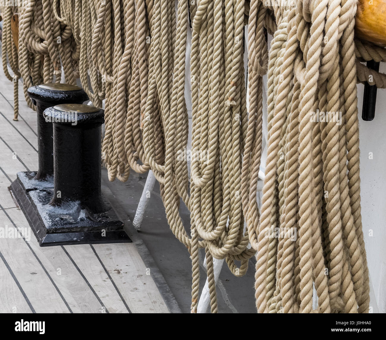Ropes on the side of an old sailing ship Stock Photo - Alamy