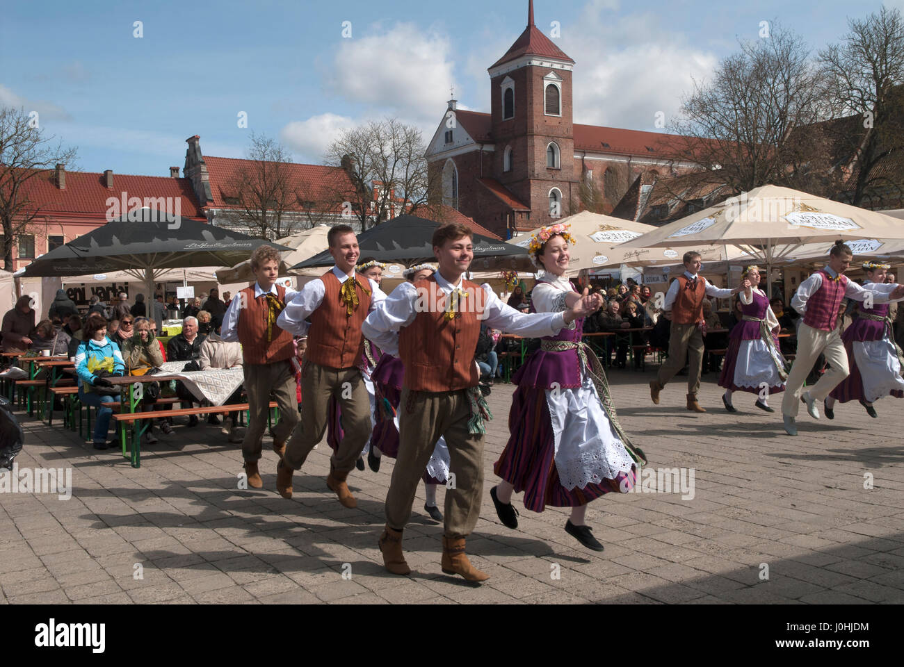 Kaunas Lithuania folk traditional dancing in the Town Hall Square Old Town during the Spring market fair. 2017 2010s, HOMER SYKES Stock Photo