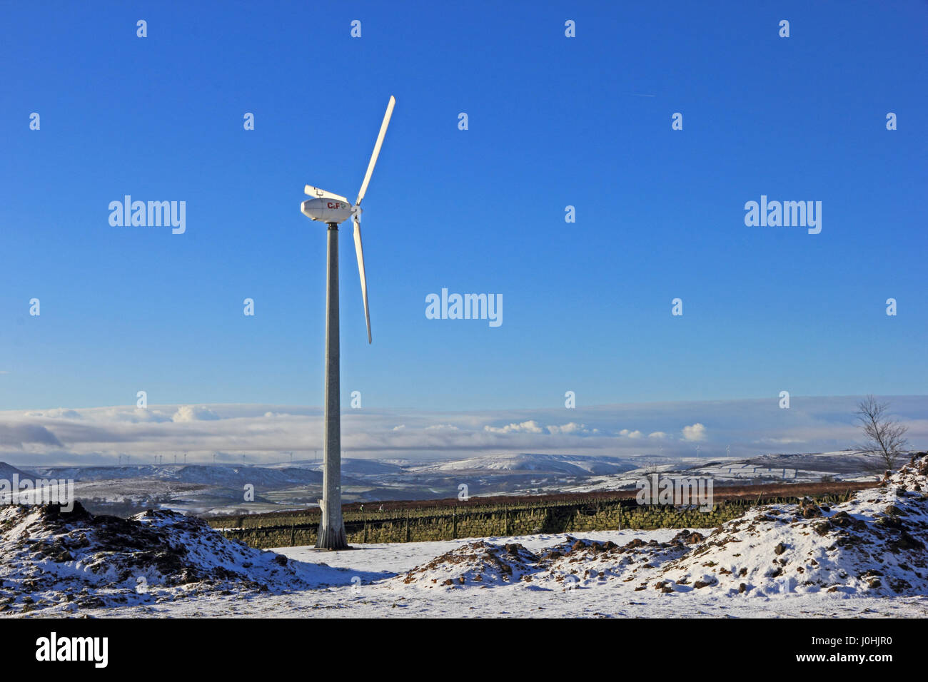 Wind turbine on Pennine hills above Hebden Bridge, in winter Stock Photo