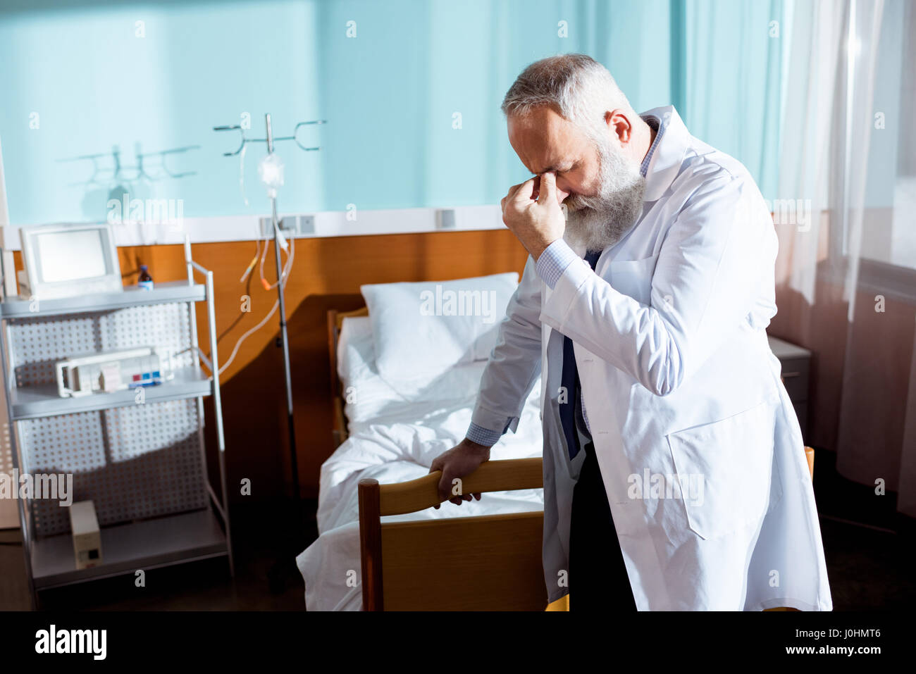 Man hospital bed side upset hi-res stock photography and images - Alamy