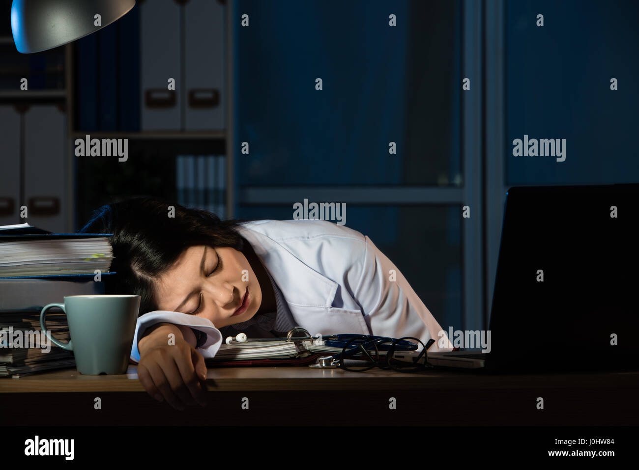 Doctor desk night hi-res stock photography and images - Alamy