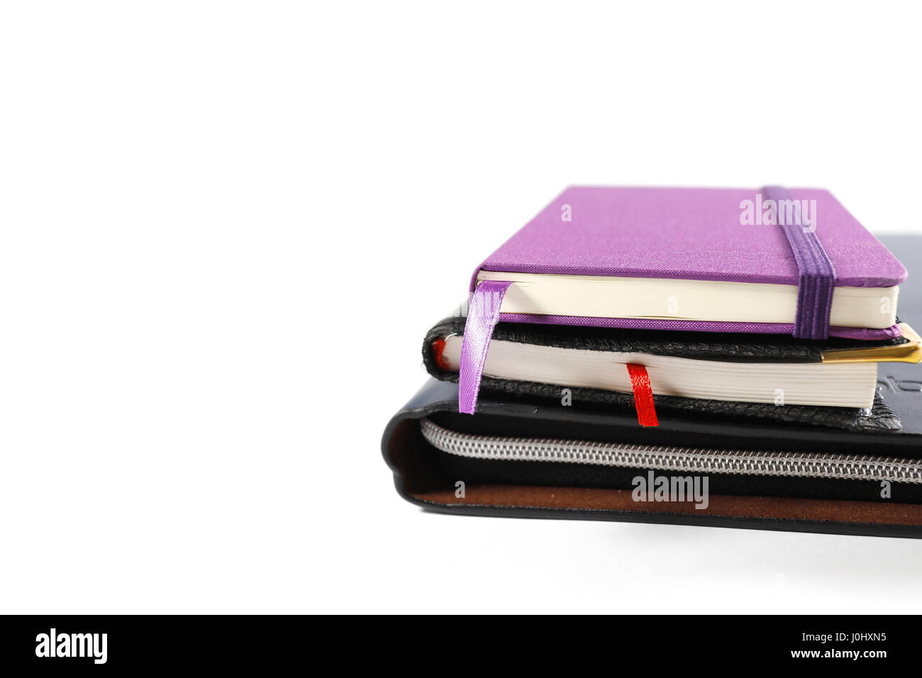 Notebooks isolated on white background Stock Photo - Alamy