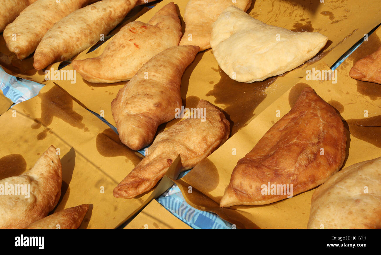 Many italian stuffed fried bread called Panzerotti or Pizza Puff with ...