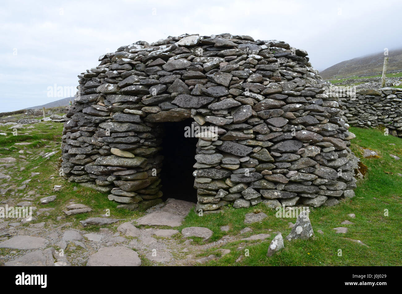 Clochan beehive huts in Dingle Ireland. Stock Photo