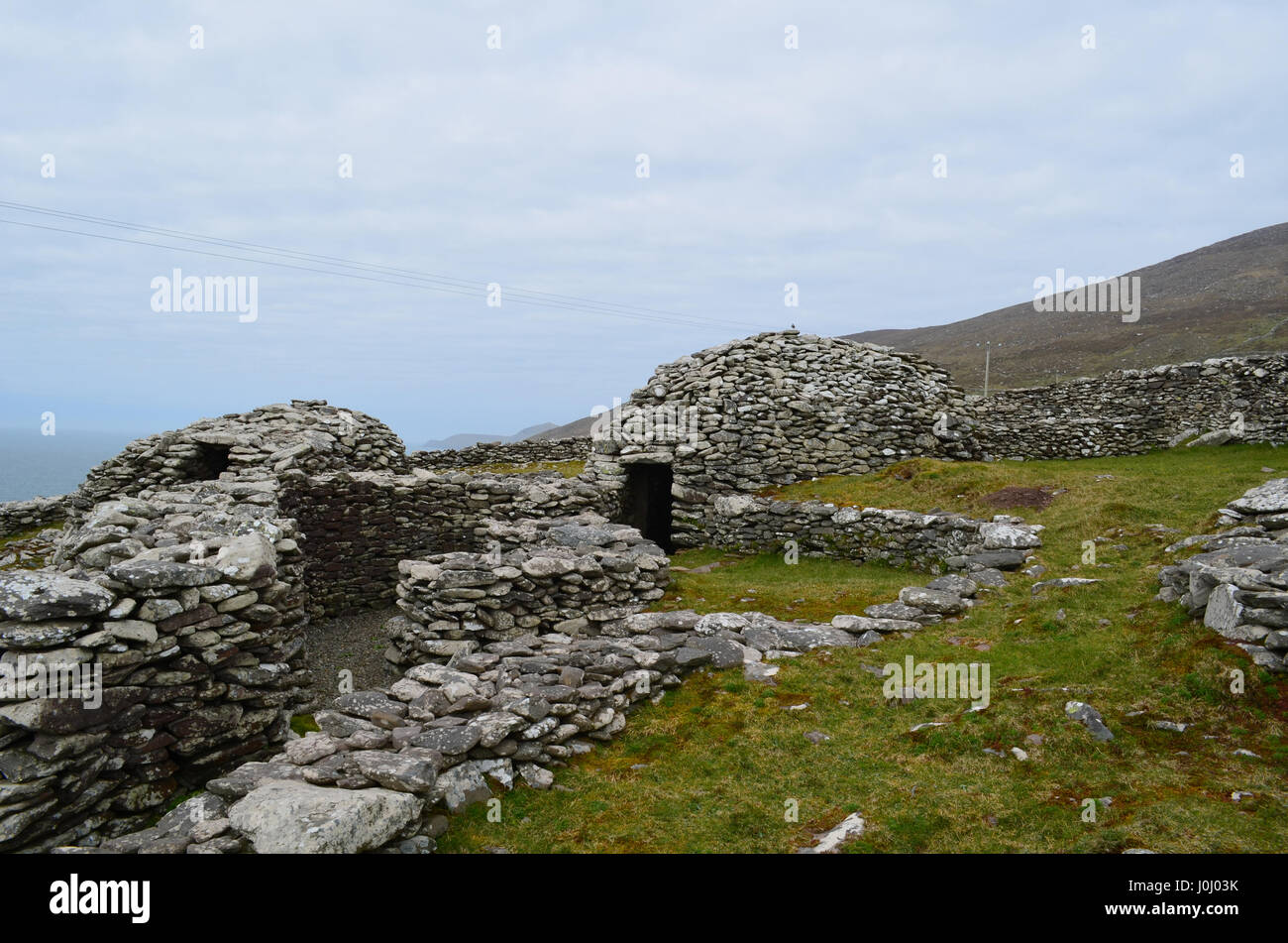 Fantastic collection of beehive huts in Dingle Ireland. Stock Photo