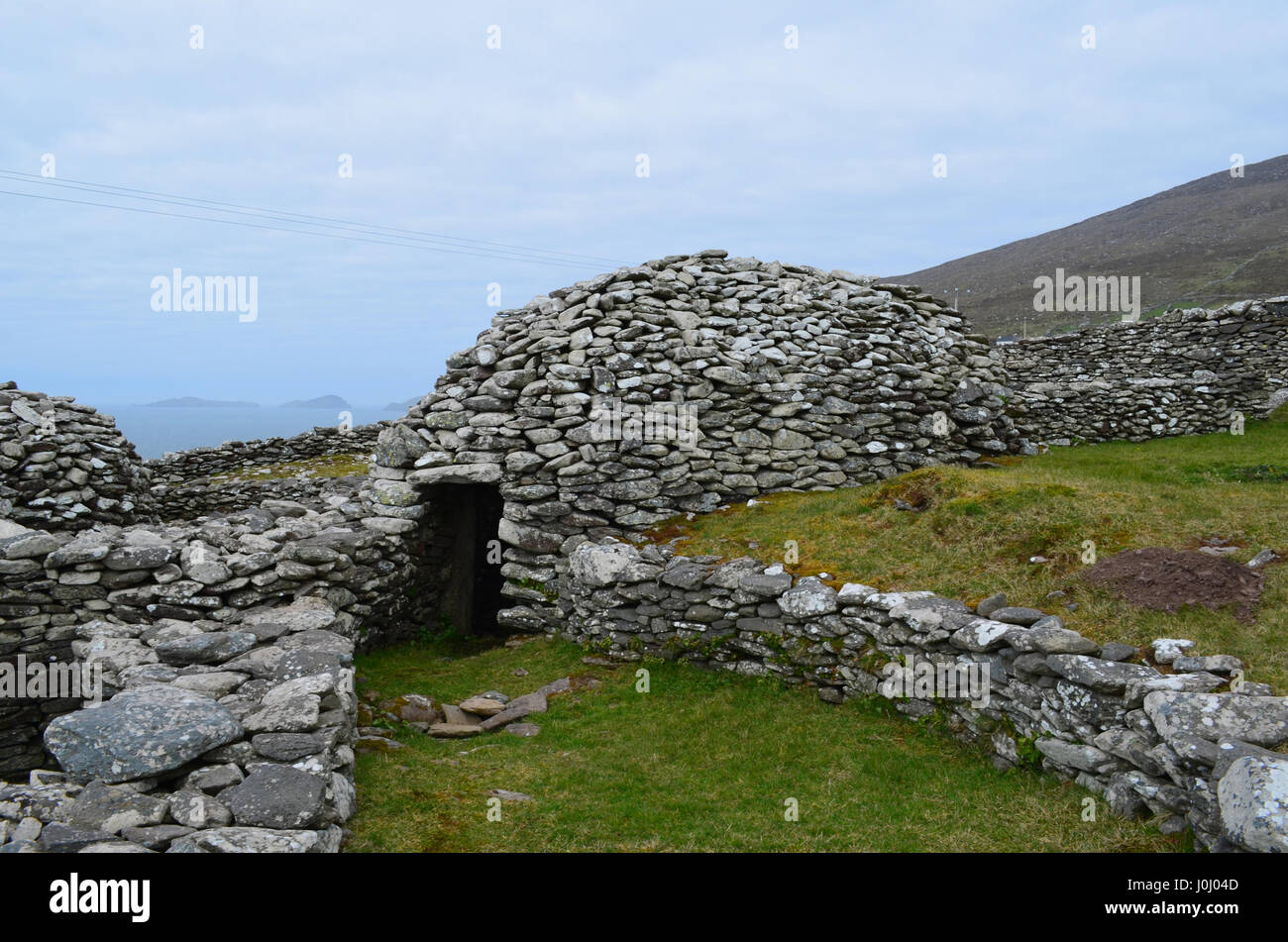 Beehive huts still standing on the Dingle Penninsula in Ireland. Stock Photo