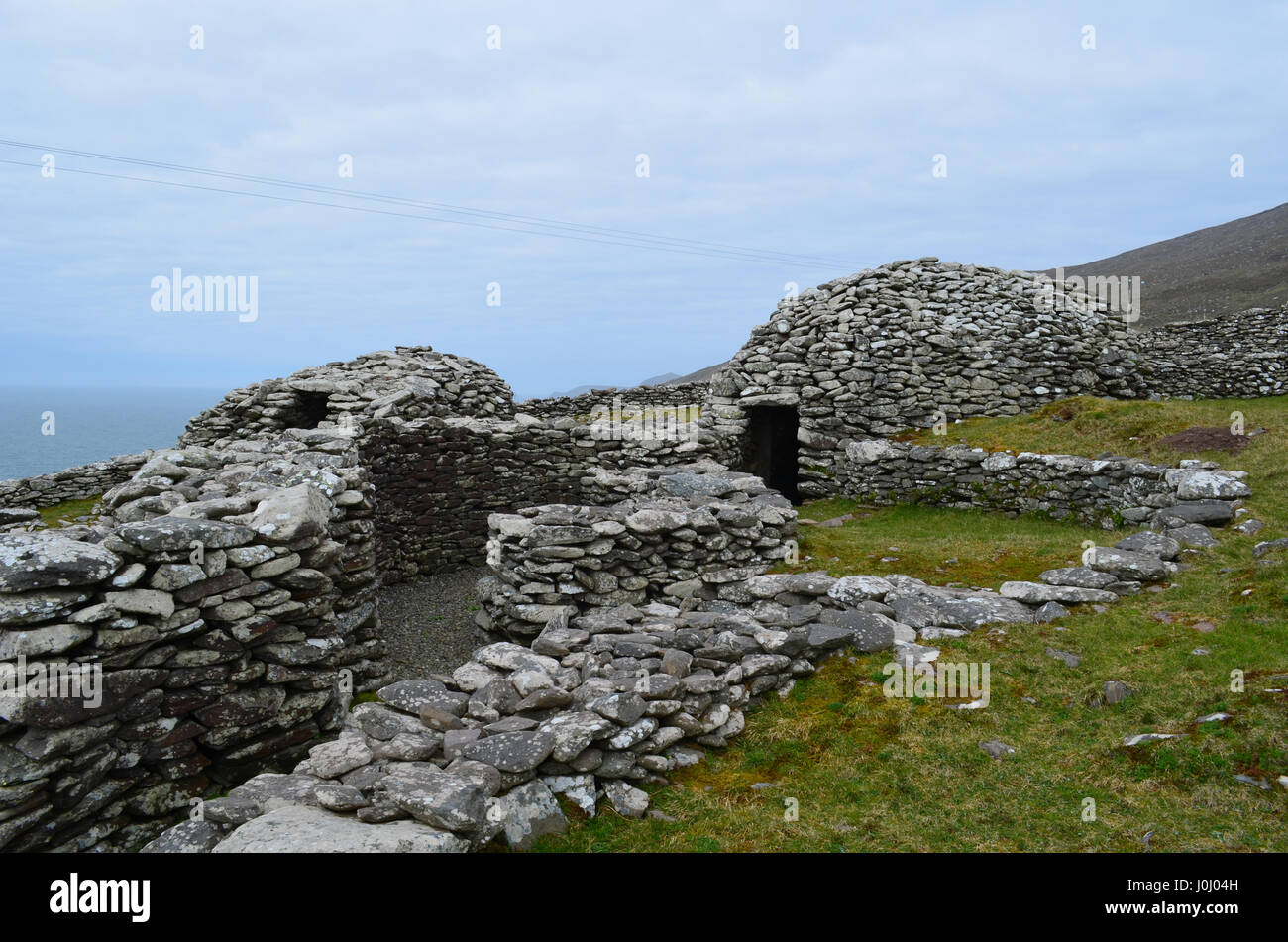 Dingle penninsula's beehive huts almost entirely intact. Stock Photo