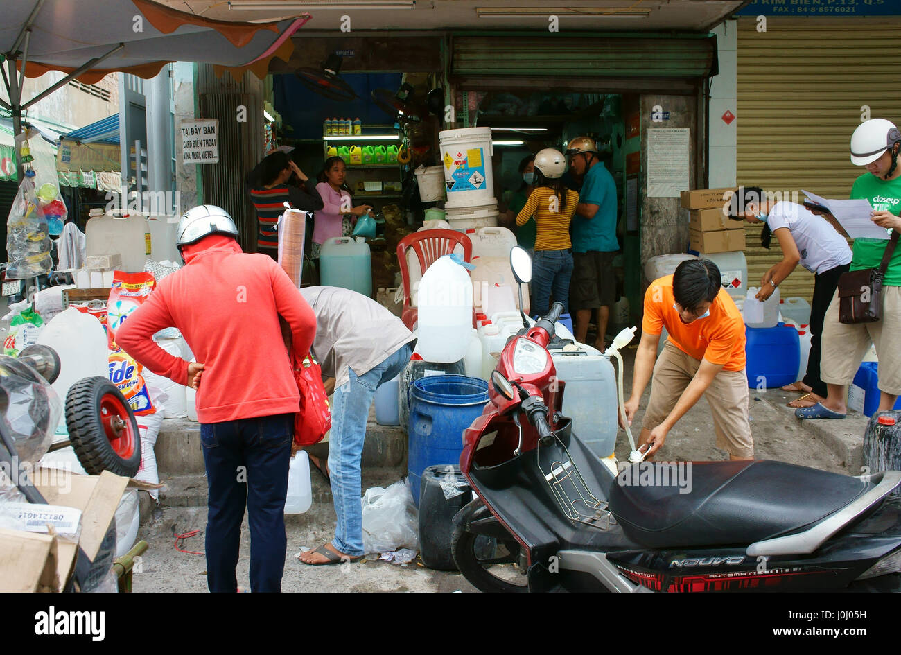 Ho Chi Minh city, Viet Nam, chemical store at Kim Bien market, electric pole in shop, risk of burn, explode at residential, danger life, Vietnam Stock Photo