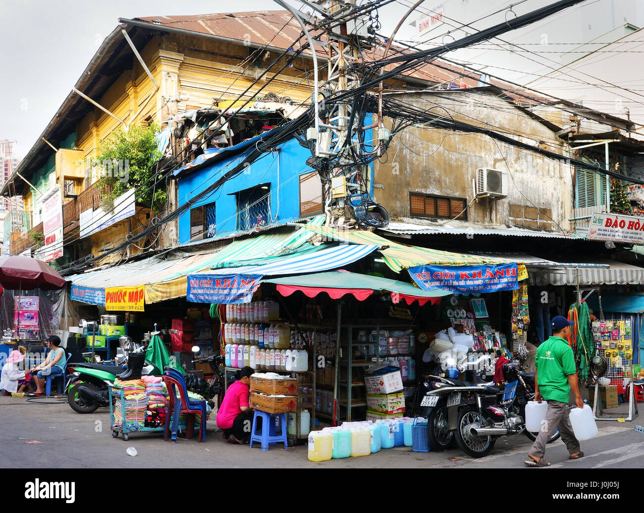 Ho Chi Minh city, Viet Nam, chemical store at Kim Bien market, electric pole in shop, risk of burn, explode at residential, danger life, Vietnam Stock Photo